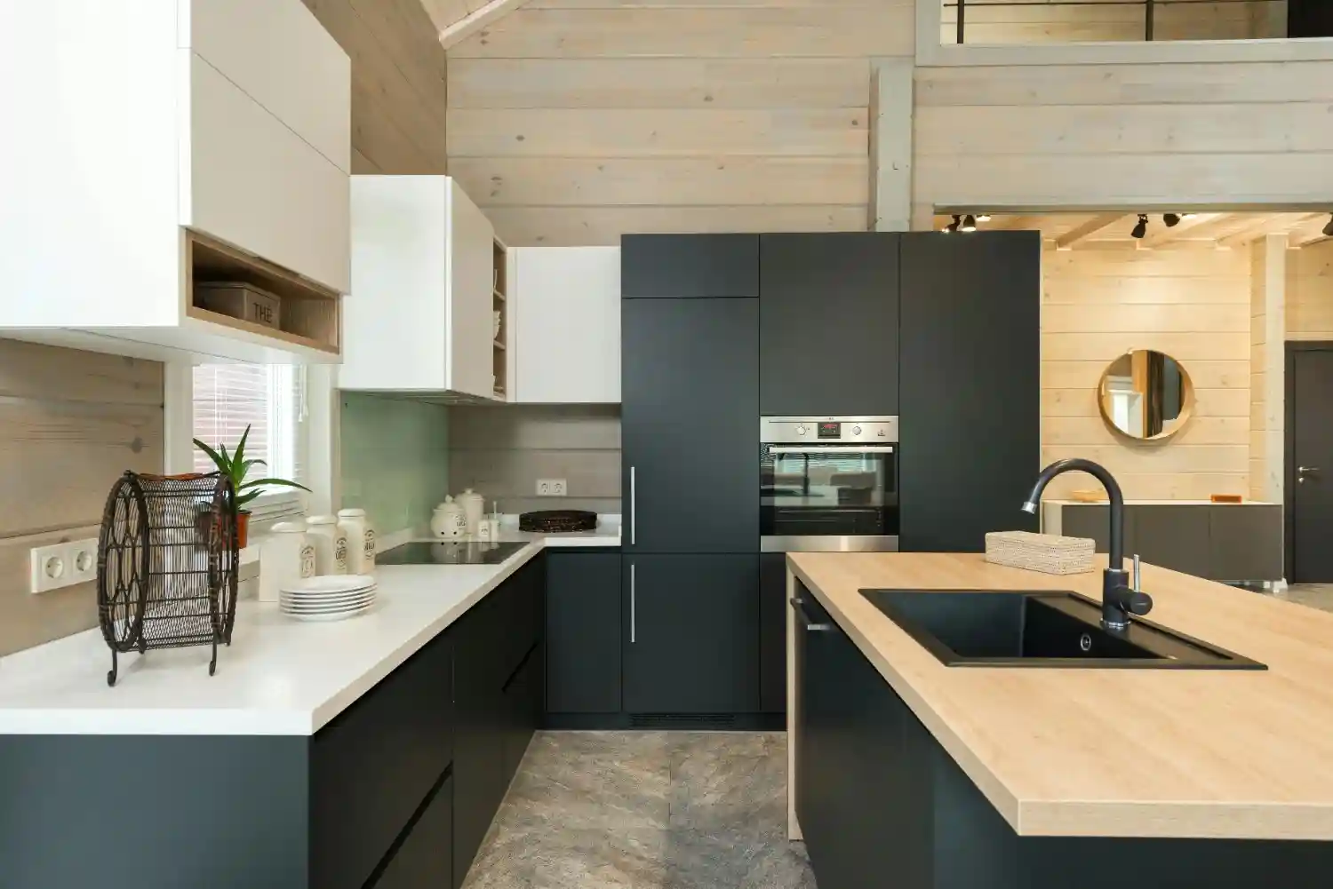 Farmhouse style kitchen showing painted cabinets with farmhouse sink and simple hardware